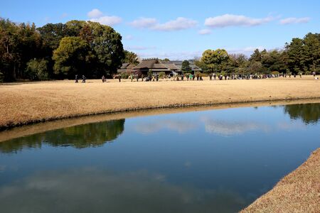 View of lake of Okayama Korakuen Garden in autumnの写真素材