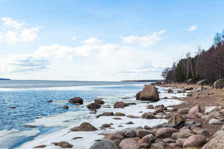 Sunny winter lake shore with blue sky. Ladoga lakeの写真素材