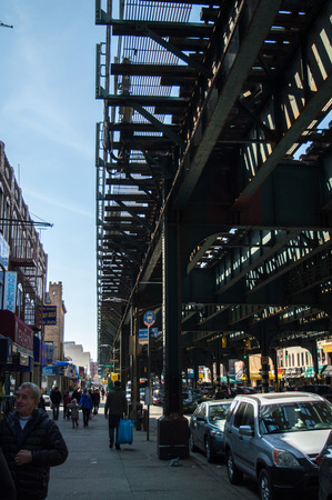 New York, NY  USA - April 2016: streets of Brighton Beach under the metal transport bridge.のeditorial素材