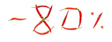 Hot sale or discount concept. Writing made of fresh chilli peppers on white background. Eighty percent discount rate.の写真素材