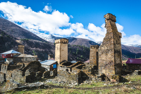 Picturesque landscape of aged Georgian rural community Ushguli with Typical Svaneti defensive tower houses in valleyの写真素材