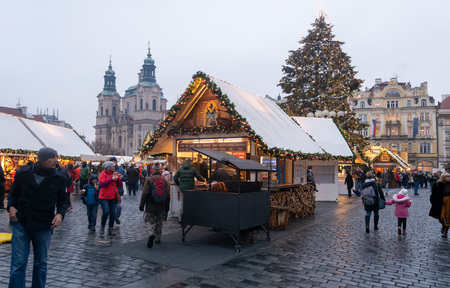 Prague, Czech Republic - December 2018: Christmas market at Old Town Square with gothic Tyne cathedral. Centre of Prague is UNESCO protected.のeditorial素材