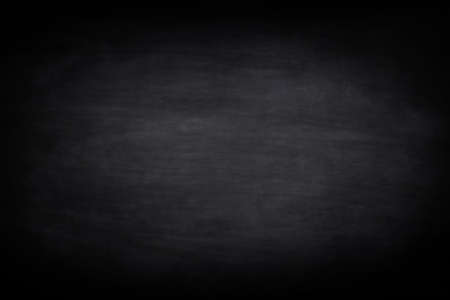 Chalkboard or black board texture abstract background with grunge dirt white chalk rubbed out on blank black billboard wall, copy space, element can use for wallpaper education communication backdropの写真素材