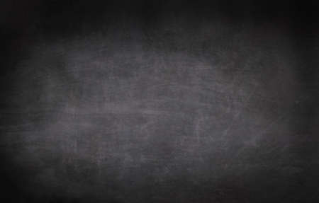 Chalkboard or black board texture abstract background with grunge dirt white chalk rubbed out on blank black billboard wall, copy space, element can use for wallpaper education communication backdropの写真素材