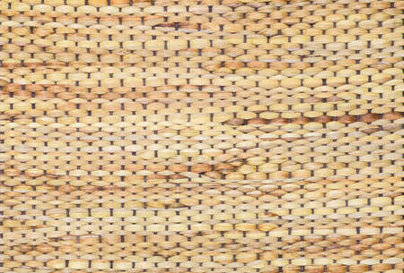 wicker of straw and reed mat woven stripe lines pattern texture for wallpaper background