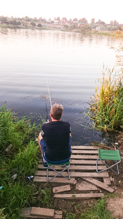 Fishing with last sunlightsの写真素材