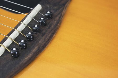 Acoustic guitar on isolated background, musical instruments.