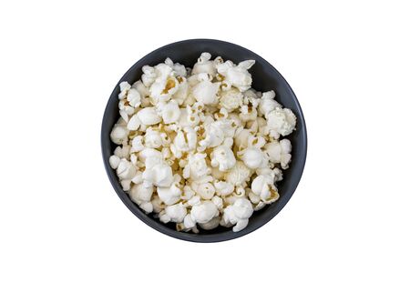 Pop corn snack in bowl, on the isolated white background. Top view, banner mockup for cinema and tv movieの写真素材