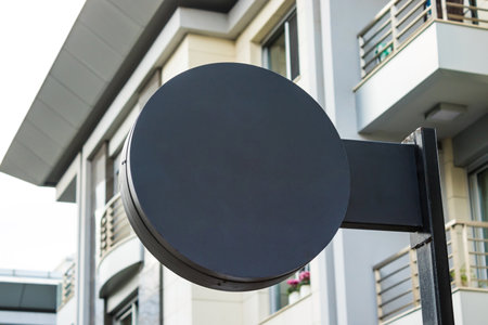 signboard mockup and template empty frame for logo or text on exterior street advertising city shop background, modern flat styleの写真素材