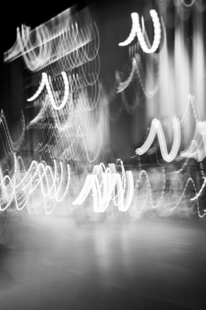 black and white abstract and artistic themed shake effect, night street and city photographyの写真素材