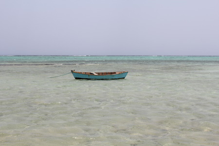 Egyptian beach with mountains and boat at Red sea Egyptの写真素材