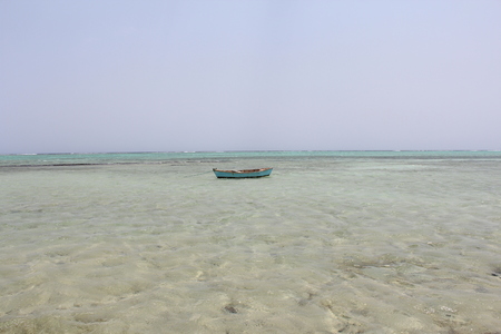 Egyptian beach with mountains and boat at Red sea Egyptの写真素材