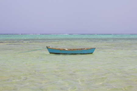 Egyptian beach with mountains and boat at Red sea Egyptの写真素材
