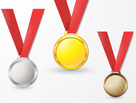 Medals gold silver bronze copper on a red ribbon isolated on backgroundの写真素材