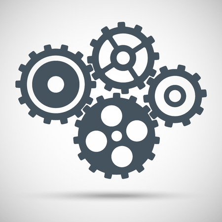 Toothed gears is meshed on gray backgroundのイラスト素材