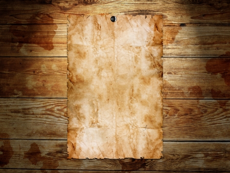 Old paper on the wood backgroundの写真素材