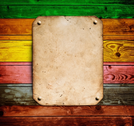 Old paper on the color wood backgroundの写真素材