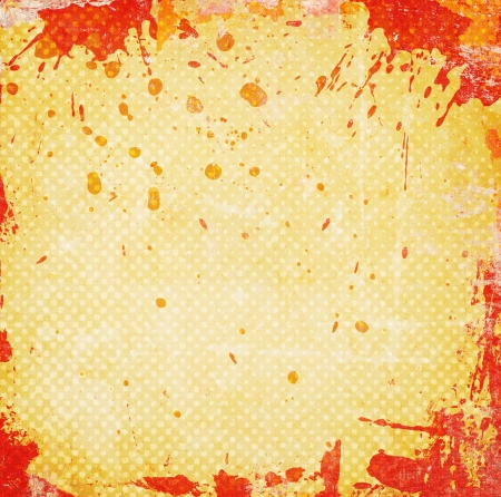 Orange grunge background with stainsの写真素材