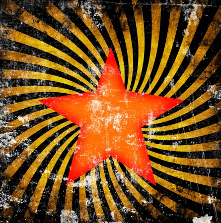 Orange star with twirl on grunge backgroundの写真素材