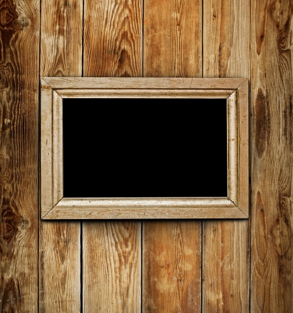 Vintage wooden frame on wood backgroundの写真素材