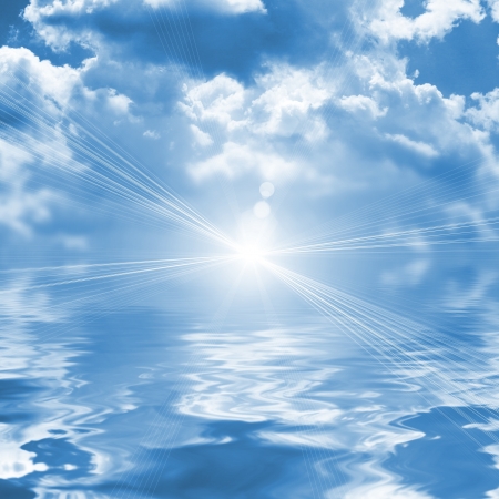 Blue sky reflected in waterの写真素材