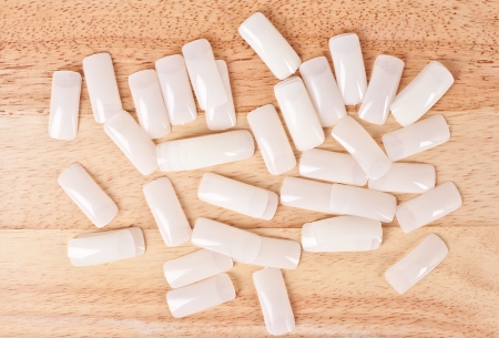 set of false nails on wooden background