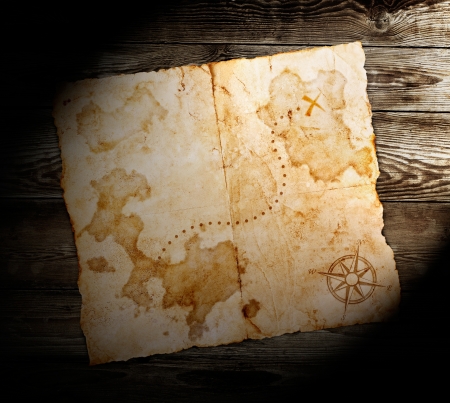 old treasure map on wooden backgroundの写真素材