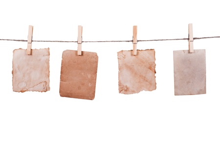 photo frames on the rope with clothespins on white backgroundの写真素材