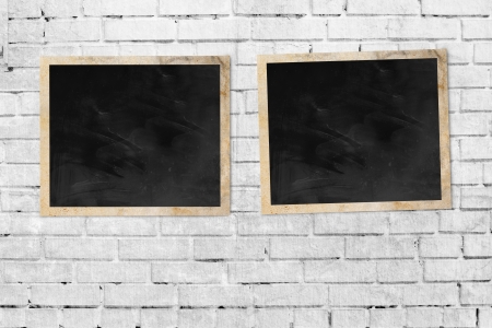 vintage frame on brick wall backgroundの写真素材