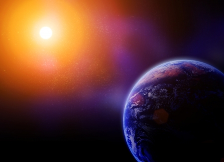 earth against the sun in space. 