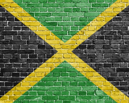 Grunge Jamaica flag on brick wallの写真素材