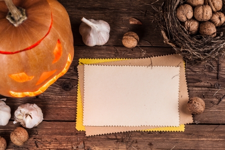 halloween background with sheet of paper and decorationの写真素材