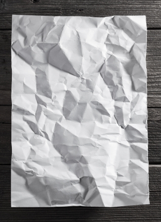 White paper on wood backgroundの写真素材