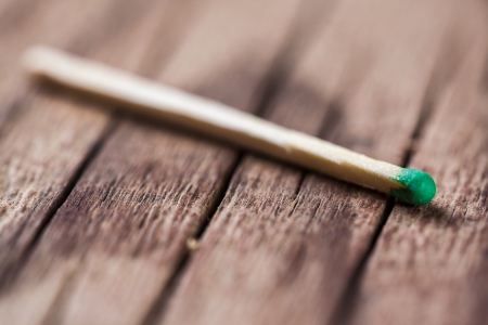 green match on wooden backgroundの写真素材