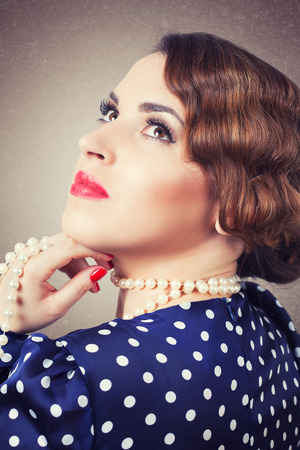 portrait of retro woman with pearlsの写真素材