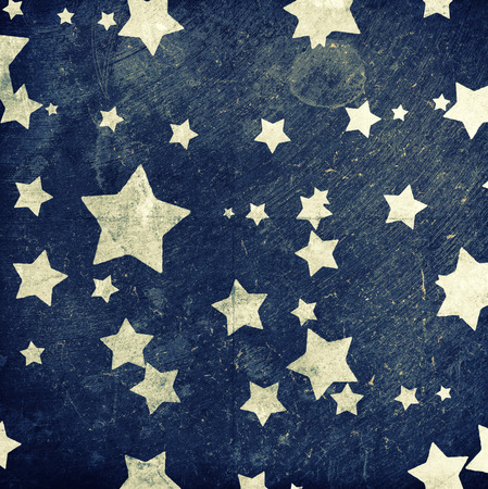 orange stars on abstract grunge backgroundの写真素材