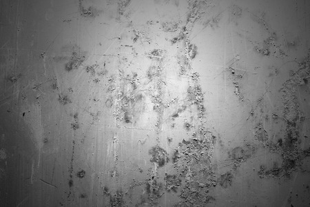 old wall with scratches and stainsの写真素材