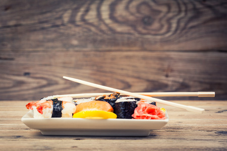 Maki Sushi set on wooden backgroundの写真素材