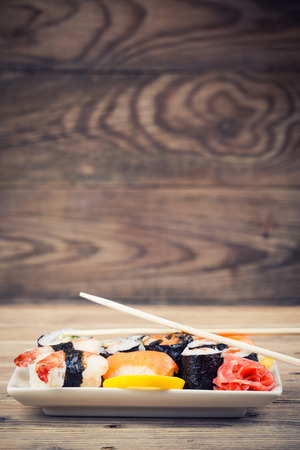 Maki Sushi set on wooden backgroundの写真素材