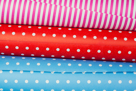 Rolls of colored wrapping paper の写真素材