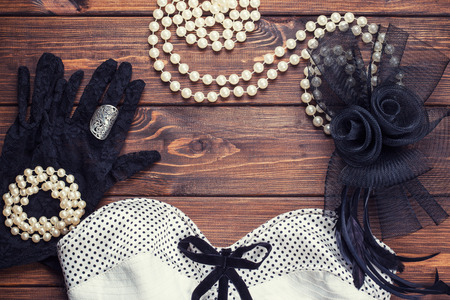 retro dress and accessories on wooden backgroundの写真素材