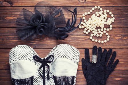 retro dress and accessories on wooden backgroundの写真素材