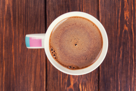 cup of coffee on wooden backgroundの写真素材