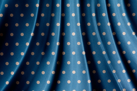 retro blue polka dot pattern with foldsの写真素材
