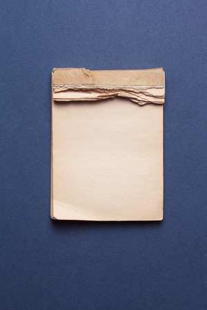 old notebook on gray backgroundの写真素材