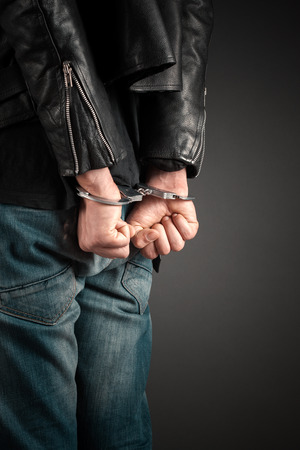 man hands in handcuffsの写真素材