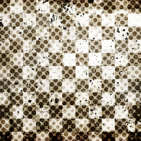 vivid grunge chessboard backgound with stainsの写真素材