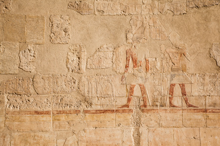 old egypt hieroglyphs carved on the stone