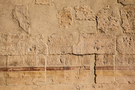 old egypt hieroglyphs carved on the stone