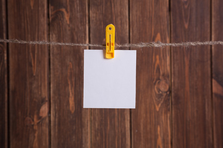 Blank instant photo hanging on the clotheslineの写真素材